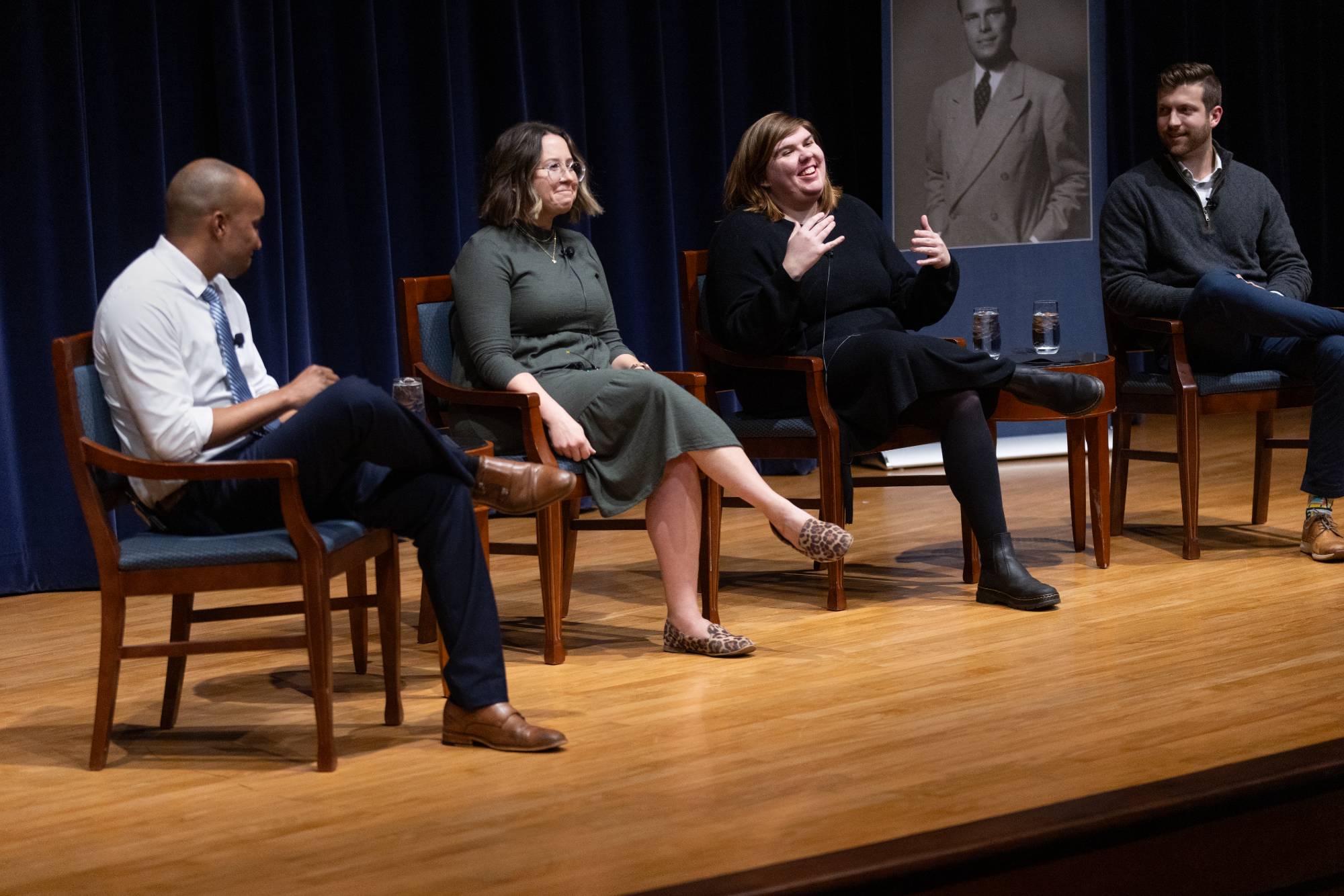 person speaking at a podium